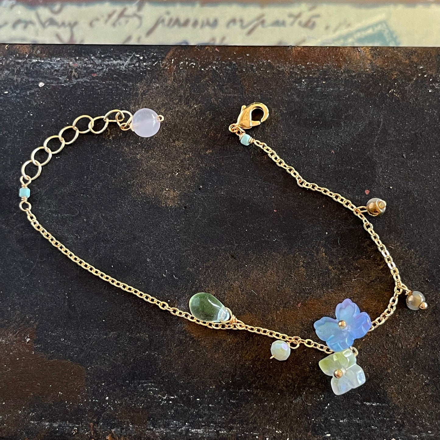 Verdant Mist Blossom: Blue & Green Hydrangea Bracelet