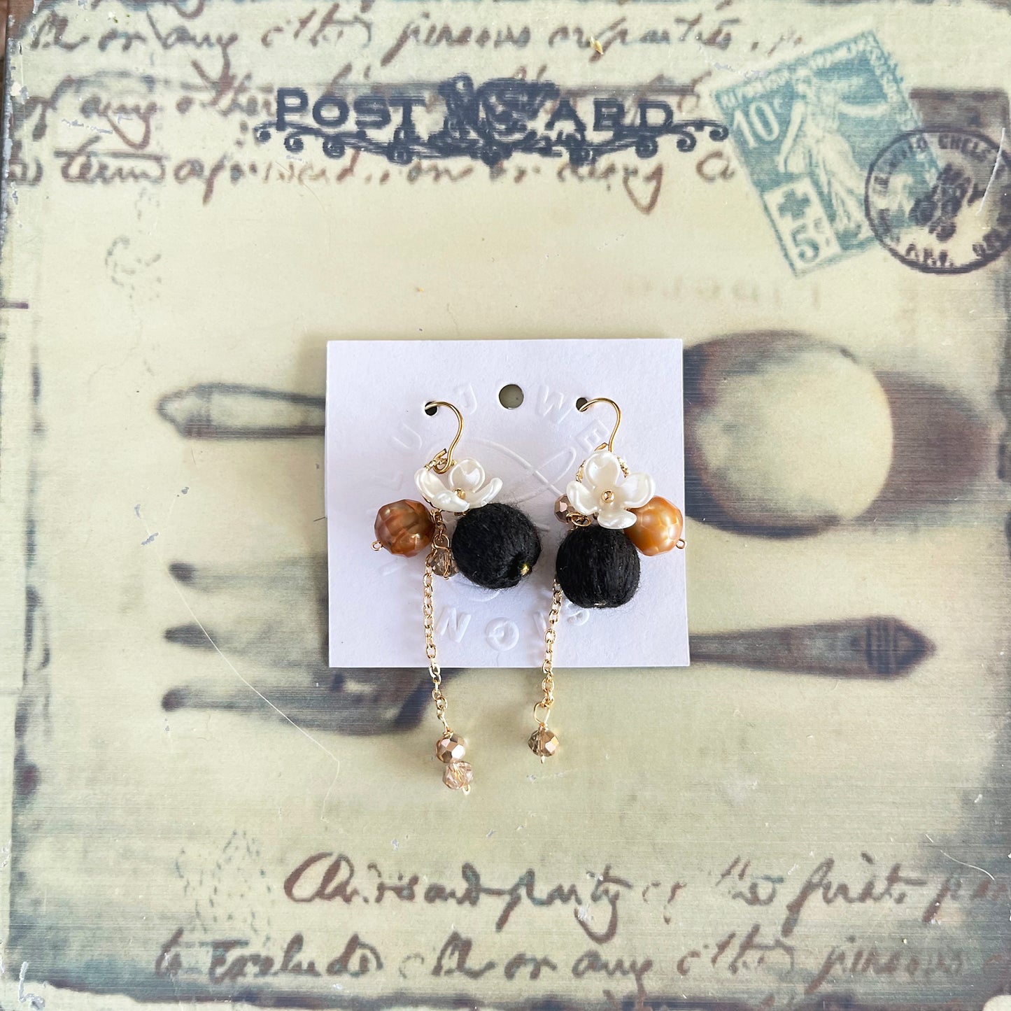 Eclectic Elegance: Midnight Black Embroidery Thread & White Blossom Earrings