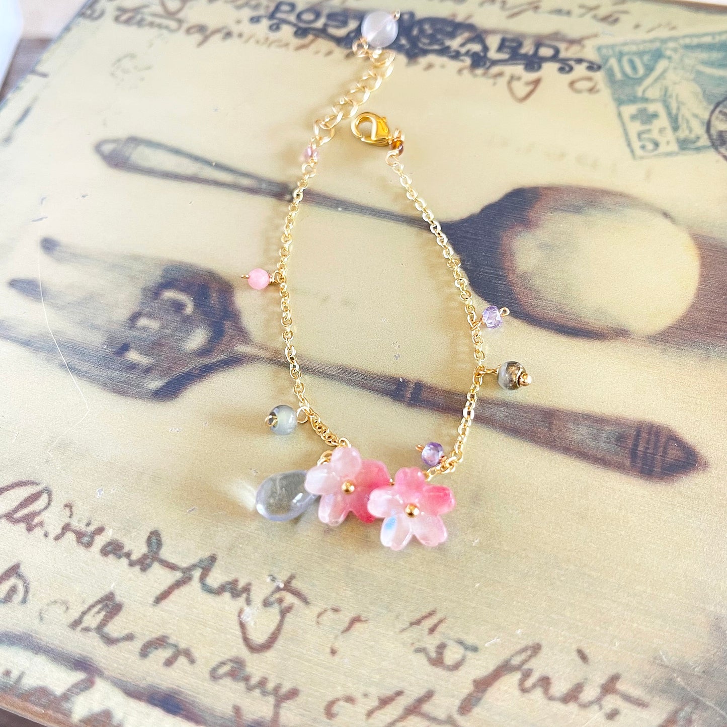 Azure Blossom: Sakura & Ice Blue Gemstone Bracelet